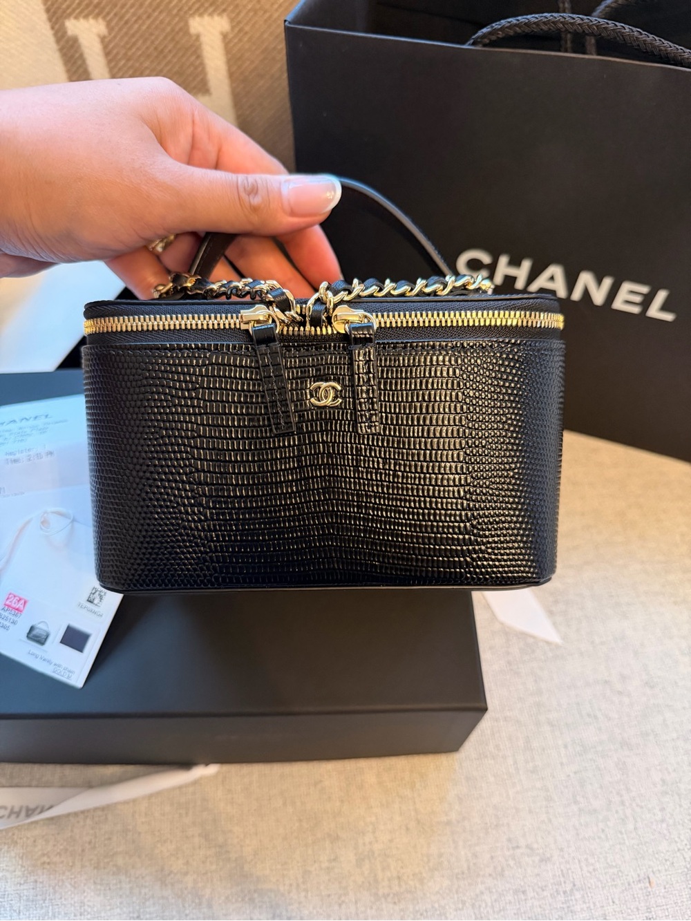 Chanel 26A Vanity Top Handle
Lizard Embossed Calfskin/Shiny Light Gold Hardware